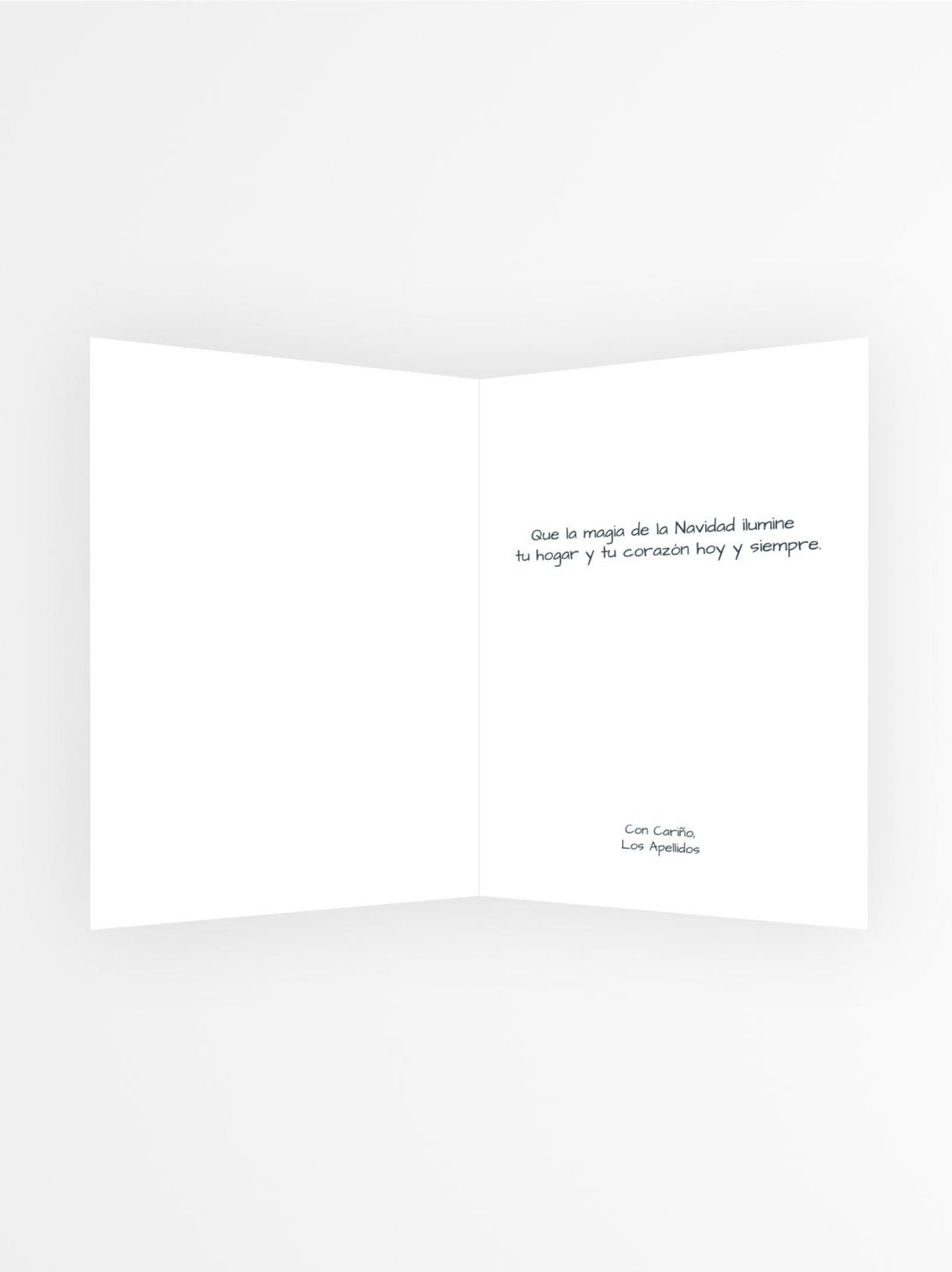 Interior de tarjeta navide&ntilde;a personalizada con mensaje navide&ntilde;o: &ldquo;Que la magia de la Navidad ilumine tu hogar y tu coraz&oacute;n hoy y siempre&rdquo;