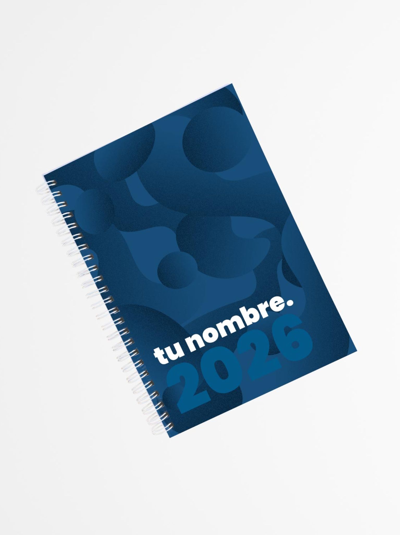portada de agenda personalizada 2026 en tonos azul marino con tipograf&iacute;a moderna y encuadernado en espiral blanca