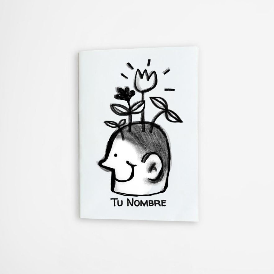 libreta art&iacute;stica con dibujo en blanco y negro de una cabeza sonriente con plantas y flores, personalizable con tu nombre