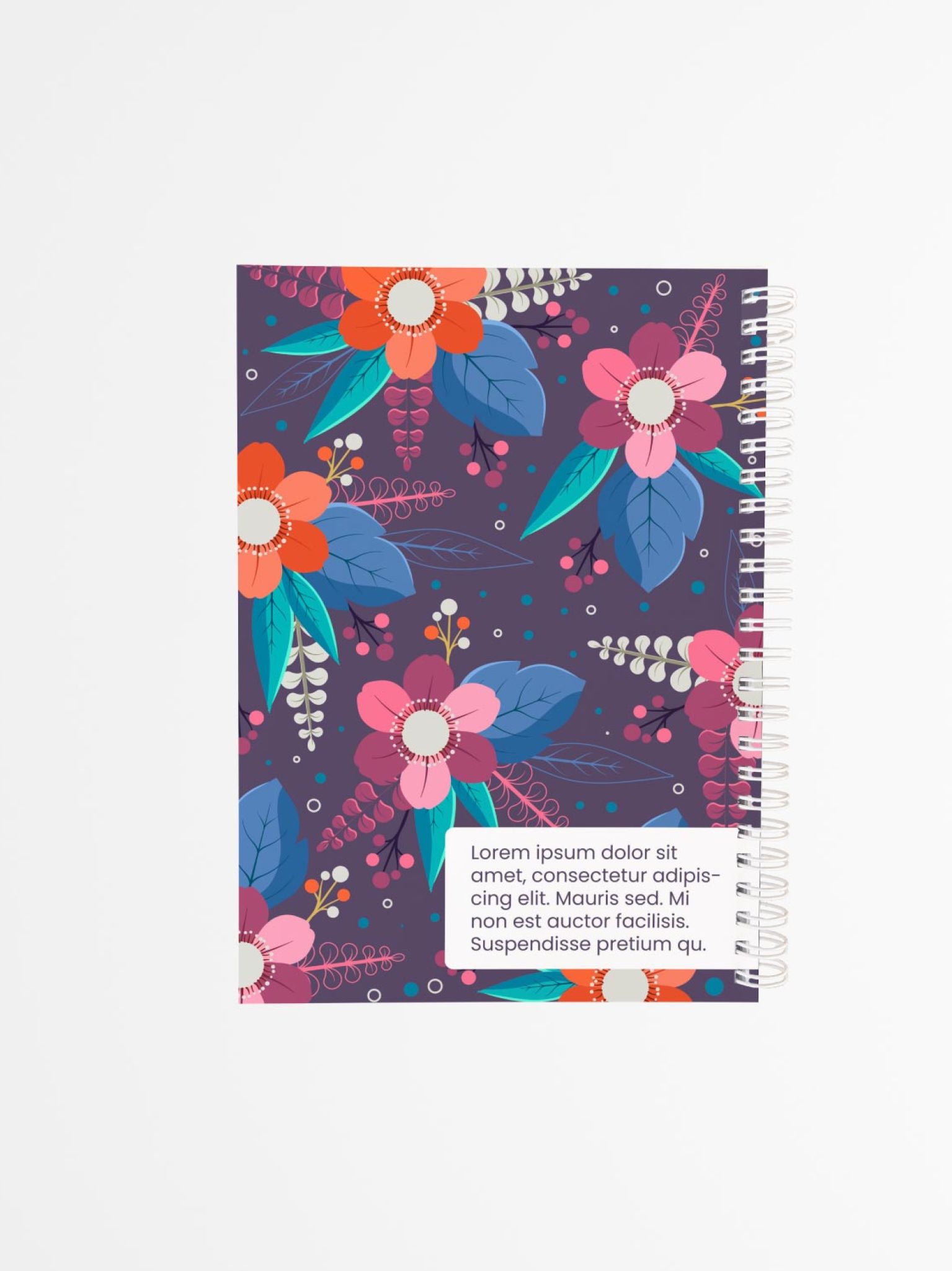 contraportada de agenda personalizada con estampado de flores en tonos vivos sobre fondo morado, con encuadernado blanco en espiral