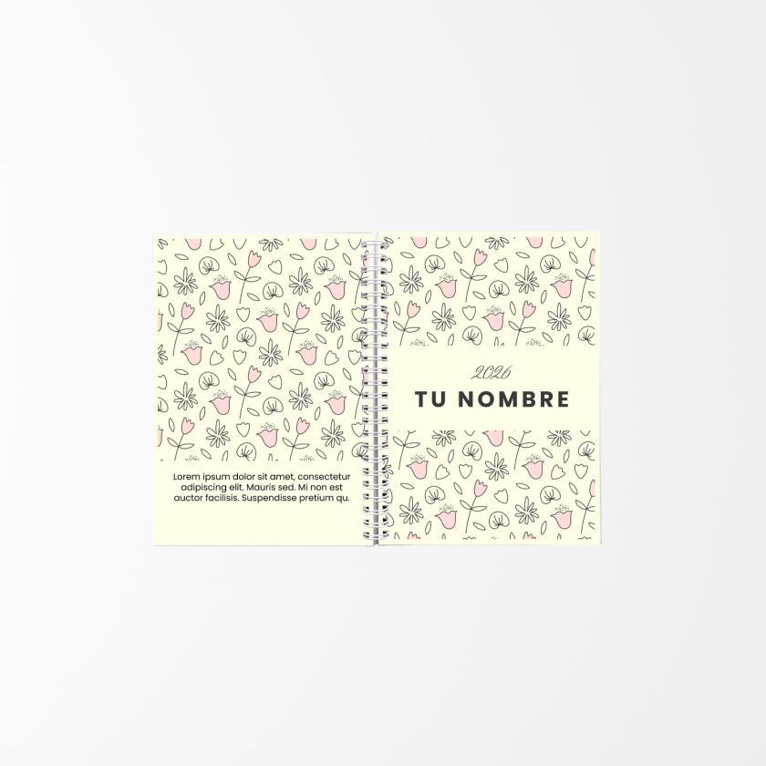 vista abierta de agenda personalizada con estampado de flores lineales en tonos suaves, encuadernada con espiral blanca y texto “Tu Nombre 2026”
