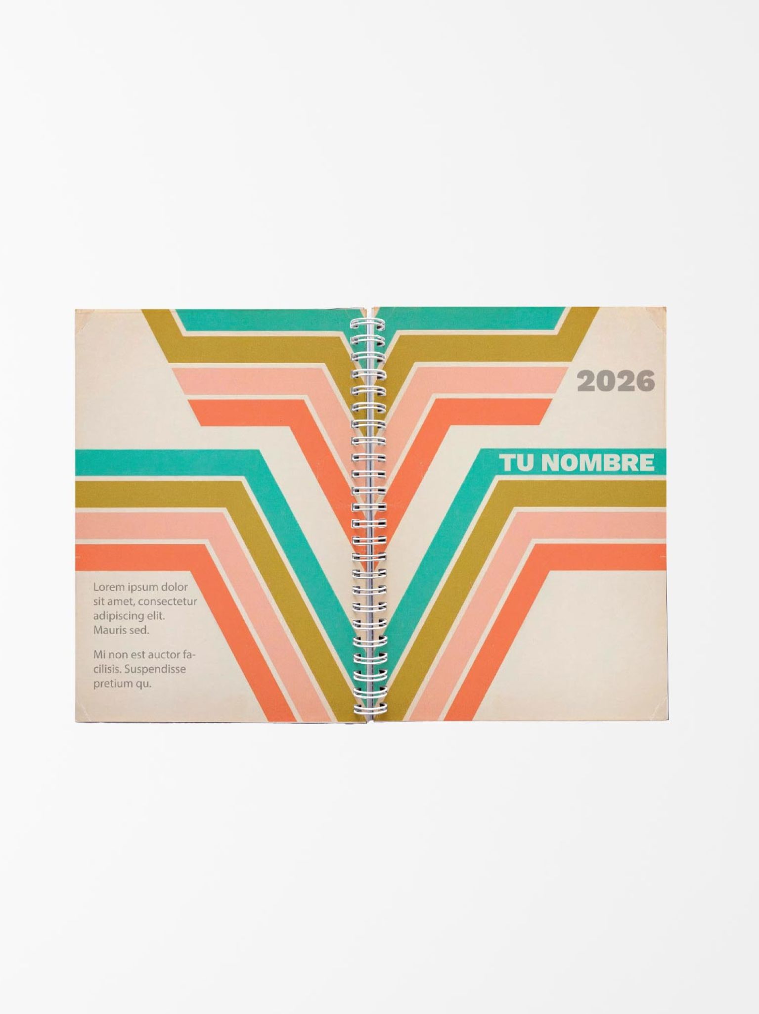 agenda abierta con diseño vintage en tonos verde, coral y dorado, encuadernada con espiral central y fondo blanco