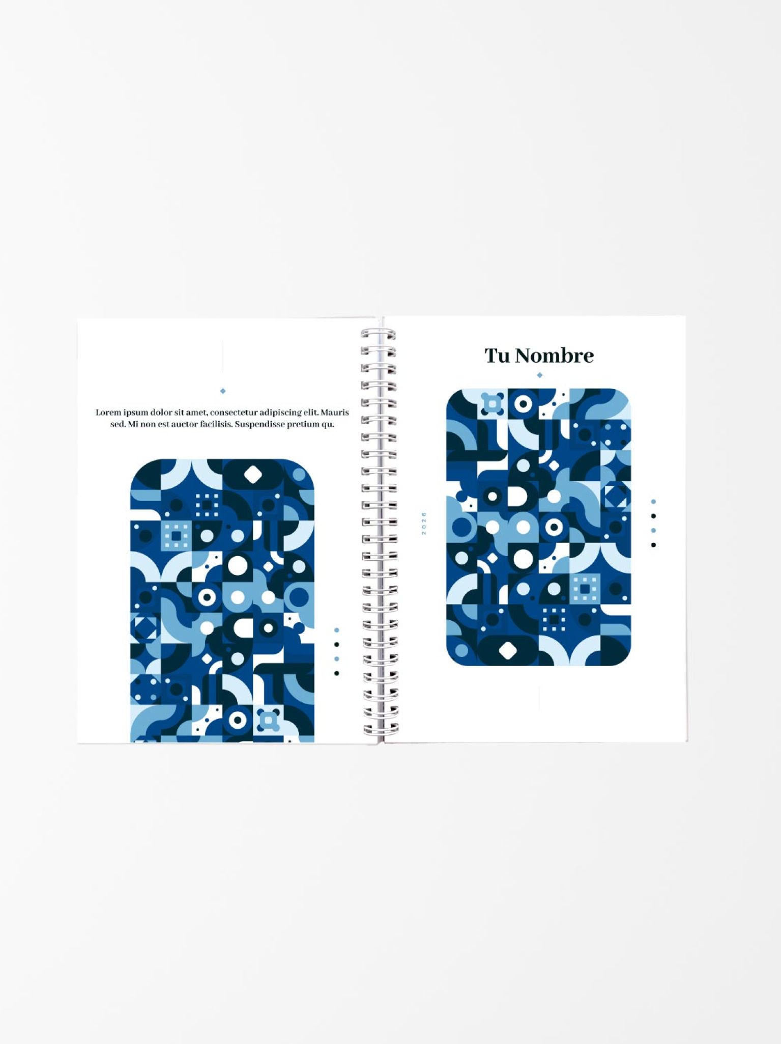 vista abierta de agenda personalizada con ilustraciones geométricas en azul, fondo blanco y detalles minimalistas, encuadernada en espiral